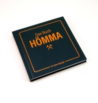Ein Schwarzes Buch mit Orangenen Layout, Title des Buches ist Das Buch Hmma - da wisse bekloppt!